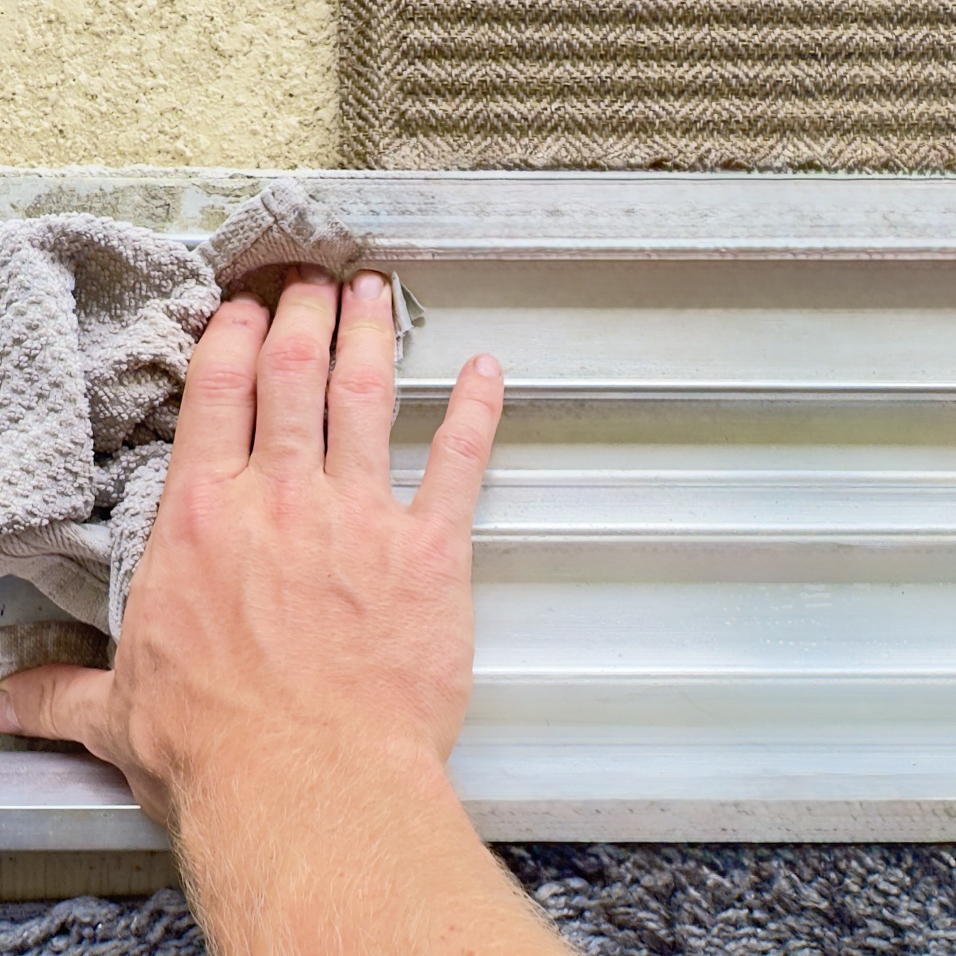 Sliding door track cleaning